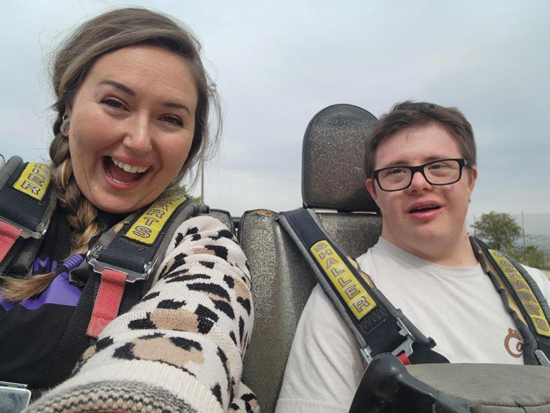 Two people enjoying go-karting